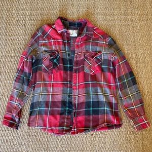 Flannel long sleeve shirt. Tag is off but it fits like a small to medium.